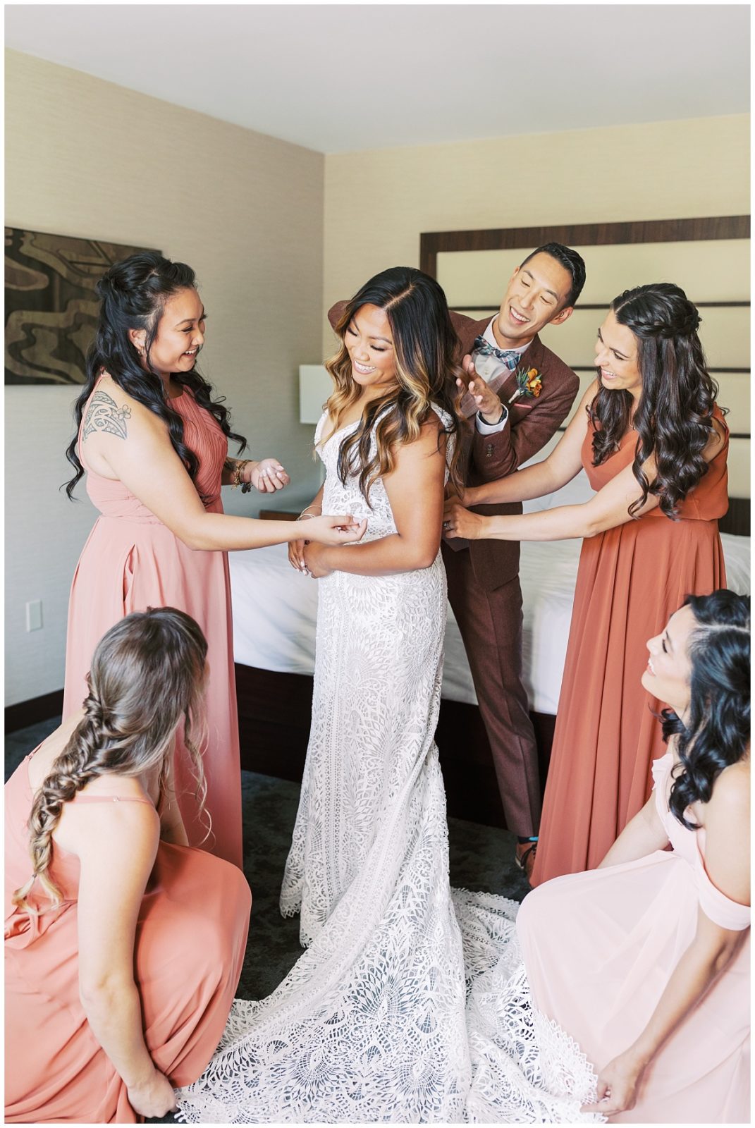Bride Getting Ready with Bridesmaid
