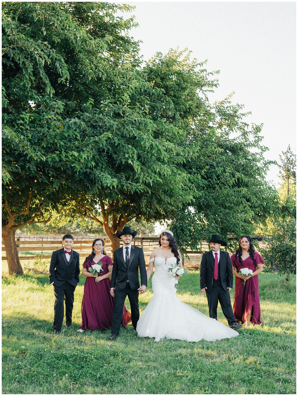 Wedding Couple and their Wedding Party walking as a group to their reception