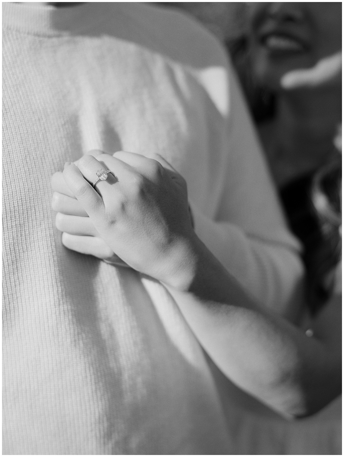 Engagement Photos of Ring in Black and White